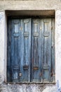 Old wooden window with shutters