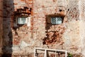 Old wooden windows on the background of an old brick wall Royalty Free Stock Photo