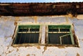 Old wooden windows blue house