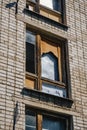 old wooden Windows in a brick house apartment Royalty Free Stock Photo