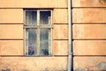 Old wooden windows frame on cement cracked wall Royalty Free Stock Photo