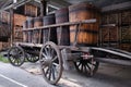 Old wooden wine barrels on a wooden cart in France Royalty Free Stock Photo