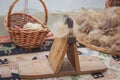 The old wooden wool winding machine with materials .Old fashioned wooden distaff, spindle, spinning wheel . wool thread in the