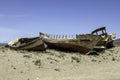 old wooden worn fishing boats abandoned on the beach of Cabo de Gata, Almeria, Spain.