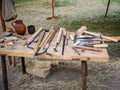 Old woodworking hand tool: wooden plane, chisel ax, sledgehammer, hammer and in a carpentry workshop on dirty rustic Royalty Free Stock Photo