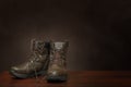 Old Work Boots On Brown Background With Copy Space Royalty Free Stock Photo