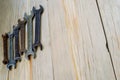 Old work tools spanner, wrench on a wooden table. Royalty Free Stock Photo