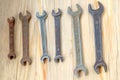 Old work tools spanner, wrench on a wooden table. Royalty Free Stock Photo