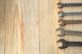 Old work tools spanner, wrench on a wooden table. Royalty Free Stock Photo
