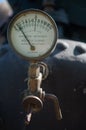 old metal pressure gauge in function to measure the pressure