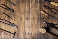 Old carpenter hand tools on weathered wooden plank background Royalty Free Stock Photo