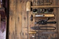 Old carpenter hand tools on wooden plank background Royalty Free Stock Photo