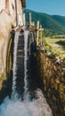 Old working watermill wheel with falling water Royalty Free Stock Photo