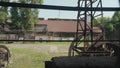 Old workshop with metal roof. Territory of abandoned metallurgic plant.