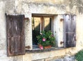Old World  Farm House Window with Flowers Royalty Free Stock Photo