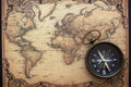 Old world map background with vintage compass, geo navigation concept Royalty Free Stock Photo