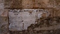 Old World War II poster on the wall. Announcement of the American allies. Erice, Sicily, Italy