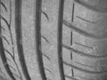 Old and worn black tire tread background Royalty Free Stock Photo