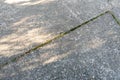 Old worn and cracked asphalt with cracks. Road surface texture background. cracks in the asphalt in the city