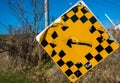 Old, worn, and damaged road sign Royalty Free Stock Photo