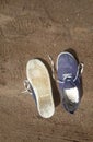 Old worn out and dirty blue sneakers Royalty Free Stock Photo