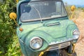 Old worn-down Mazda T1500 three-wheel truck on the island Samos in Greece