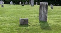 Old worn gravestones in historic Gideon Putnam Cemetery, Saratoga Springs, New York, 2018