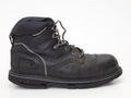 Old Worn Leather Work Boot with Cracked Sole Royalty Free Stock Photo