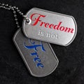 Old military dog tags - Freedom is not Free Royalty Free Stock Photo