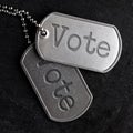 Old military dog tags - Vote Royalty Free Stock Photo
