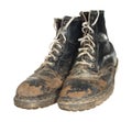 The old worn out boots with white laces isolated on white background. Royalty Free Stock Photo