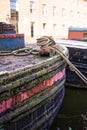old worn out canal barges with rusty hulls and peeling paint Royalty Free Stock Photo