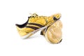 Old worn out futsal sports shoes on white background soccer sportware object isolated