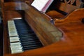 Old worn out piano close up of missing keys