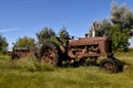 Old rusty tractor and manure spreader Royalty Free Stock Photo