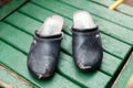 Old worn-out shoes with holes Royalty Free Stock Photo