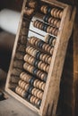 Old worn out wooden abacus on a table Royalty Free Stock Photo