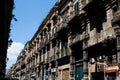 Old worn residential and commercial Palermo building.