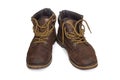 Old worn shoes are brown with yellow laces Royalty Free Stock Photo