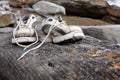 Old worn sports shoes outside