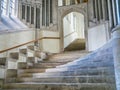 The old, worn stone staircase from the nave to the Chapter House at the gothic cathedral of Wells, in Somerset