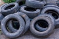 Old worn tires are a big pile in a landfill