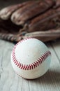 Old and worn used leather baseball sport glove over aged Royalty Free Stock Photo