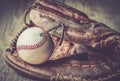 Old and worn used leather baseball sport glove over aged Royalty Free Stock Photo