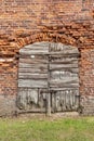 Old worn wooden door Klaipeda old port Royalty Free Stock Photo