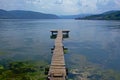 Old worn wooden pier on the border of Danube river