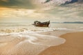 Old wreck boat on abandoned sea beach Royalty Free Stock Photo