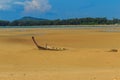 Old wreck fishing boat buried in the sand with blue sky on cloud Royalty Free Stock Photo