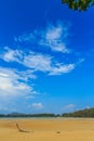 Old wreck fishing boat buried in the sand with blue sky on cloud Royalty Free Stock Photo