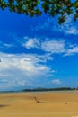 Old wreck fishing boat buried in the sand with blue sky on cloud Royalty Free Stock Photo